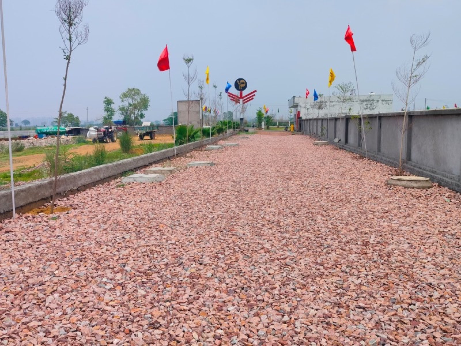 Elite Homes Sector 30 Jhajjar internal road and developed plots